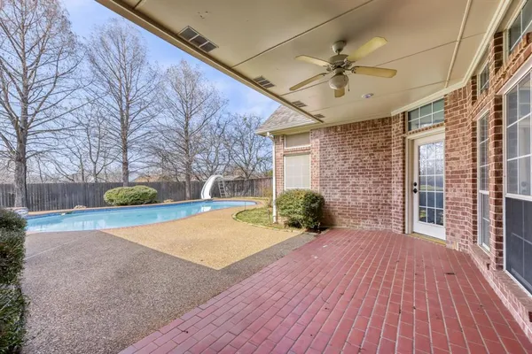 a view of a backyard with a garden