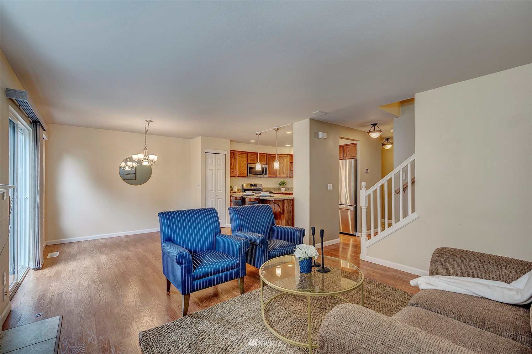 18807 19th Drive Southeast Bothell, WA 98012 - Photo 7 of 18 a living room with furniture and a wooden floor