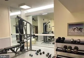 a very nice looking dining room with a table and chairs