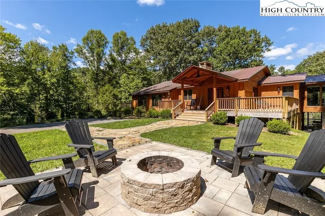 a view of a patio with chair and table of the house