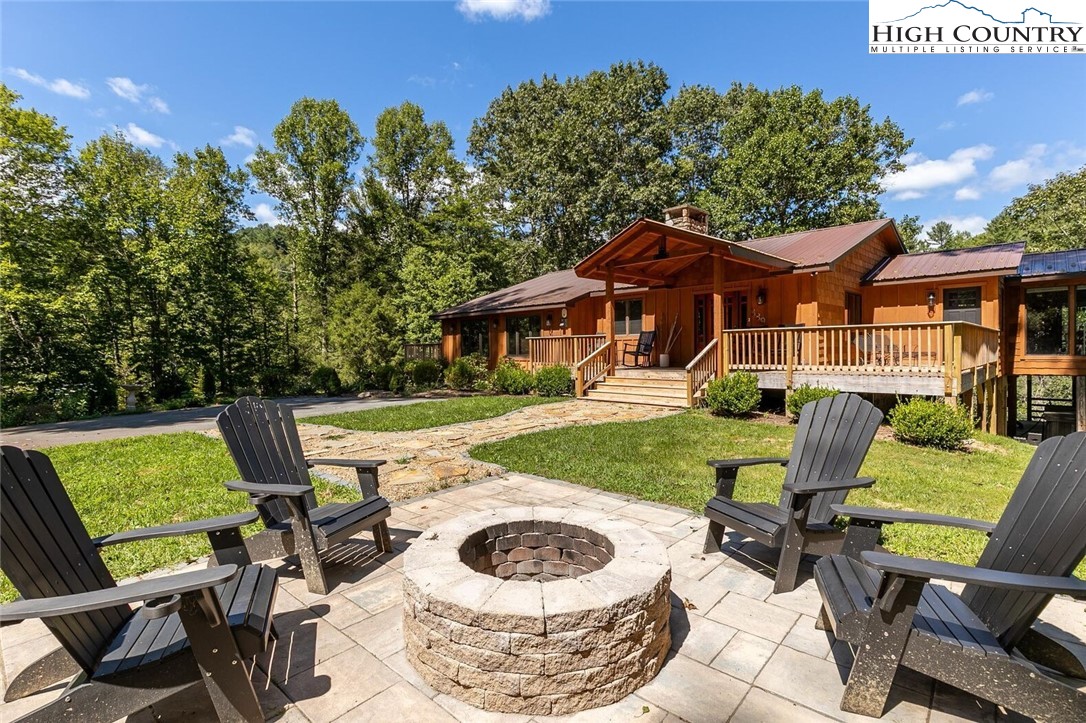 a view of a patio with chair and table of the house