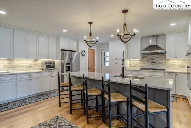 a very nice looking kitchen with a large window