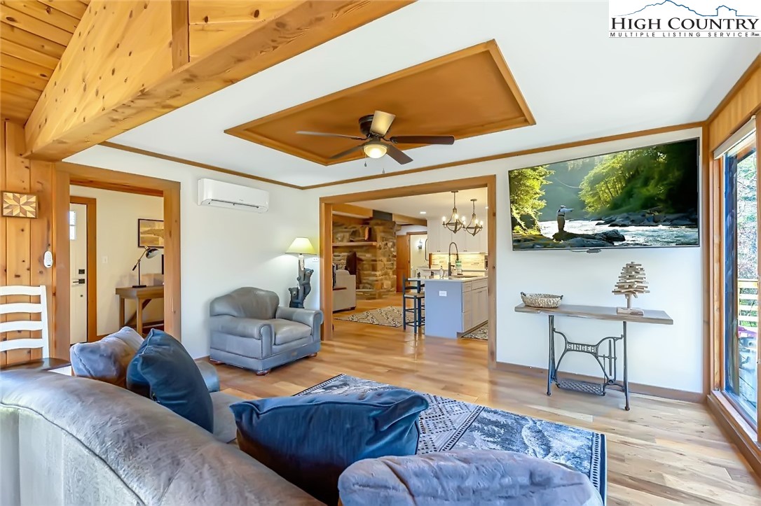 389 Auborn Trivette Road Sugar Grove, NC 28679 - Photo 16 of 49 a living room with furniture and a large window