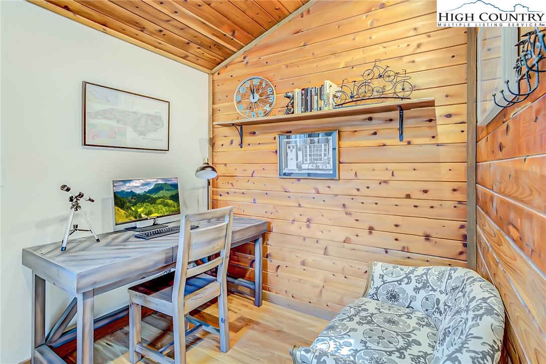 389 Auborn Trivette Road Sugar Grove, NC 28679 - Photo 17 of 49 a view of a workspace with furniture