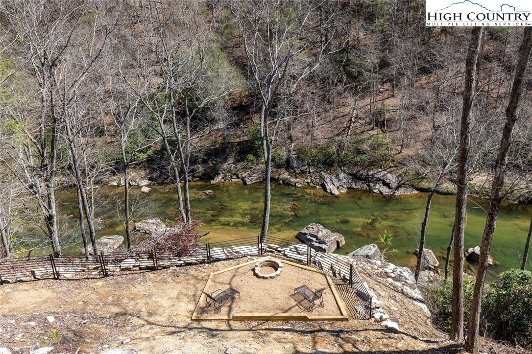 389 Auborn Trivette Road Sugar Grove, NC 28679 - Photo 31 of 49 a view of lake with a patio