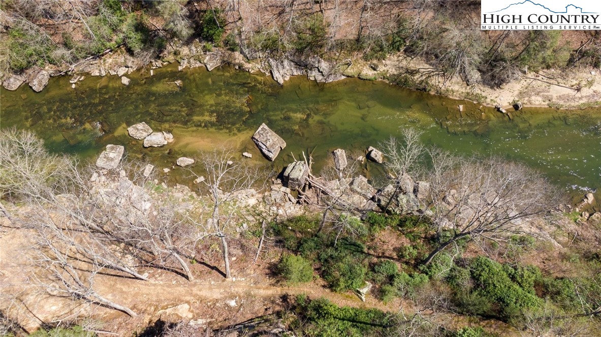 389 Auborn Trivette Road Sugar Grove, NC 28679 - Photo 4 of 49 a view of lake from yard