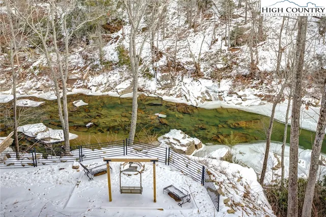 a view of a backyard of the house
