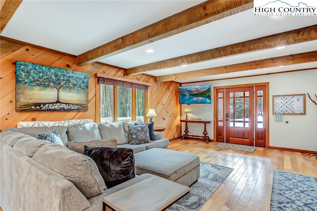 389 Auborn Trivette Road Sugar Grove, NC 28679 - Photo 10 of 49 a living room with furniture and a large window