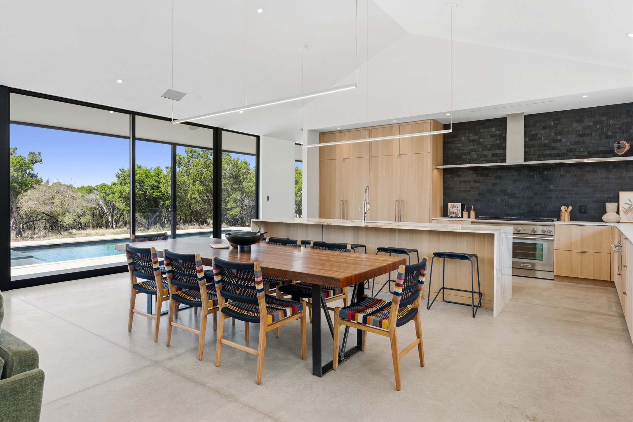10982 Long Branch Drive Austin, TX 78736 - Photo 12 of 40 a view of a dining room with furniture window and outside view