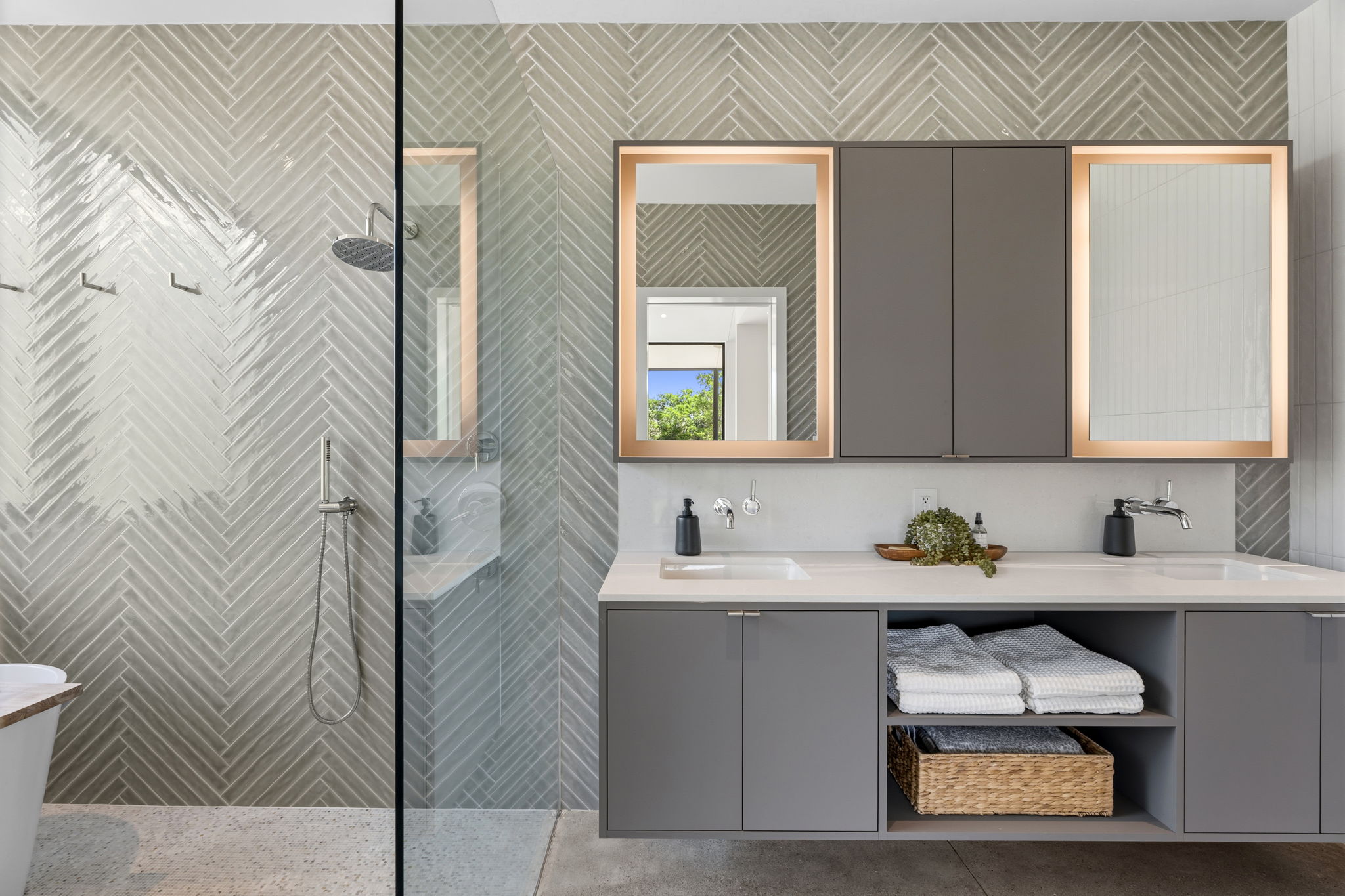 10982 Long Branch Drive Austin, TX 78736 - Photo 20 of 40 a bathroom with a sink and a mirror