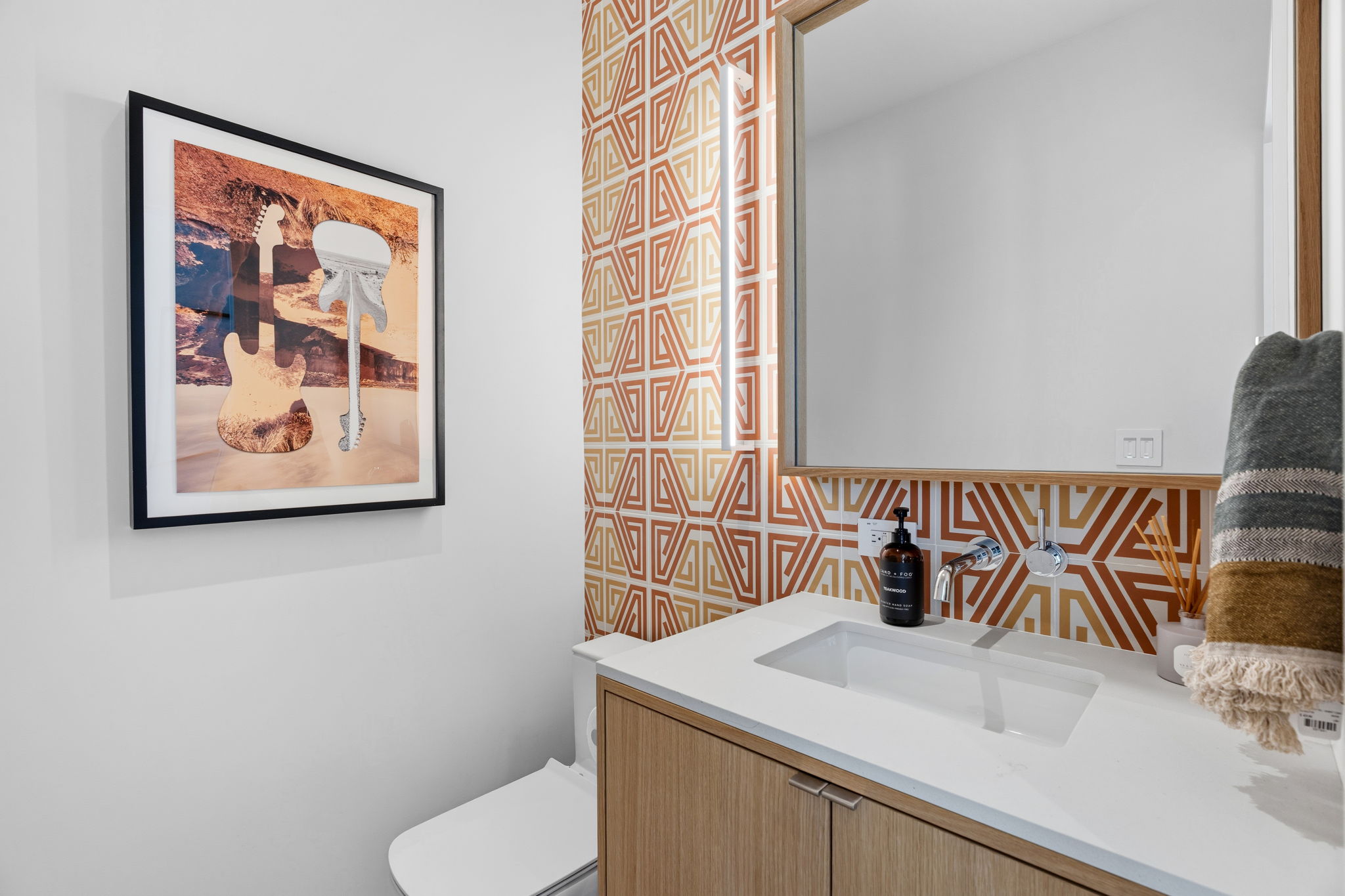 10982 Long Branch Drive Austin, TX 78736 - Photo 28 of 40 a bathroom with a sink and a toilet