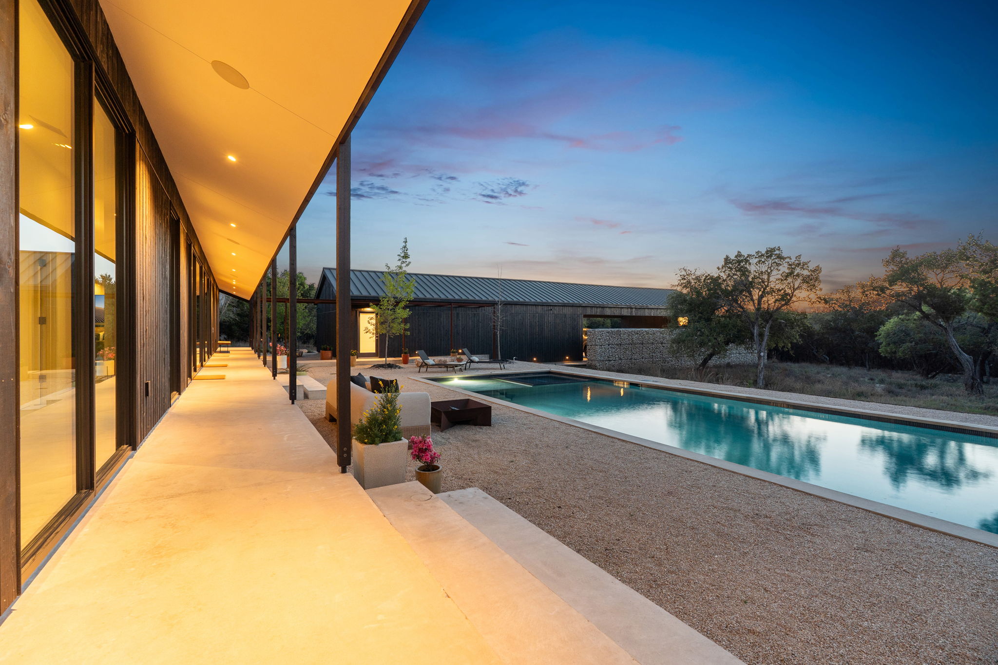 10982 Long Branch Drive Austin, TX 78736 - Photo 39 of 40 a view of swimming pool with outdoor seating and plants