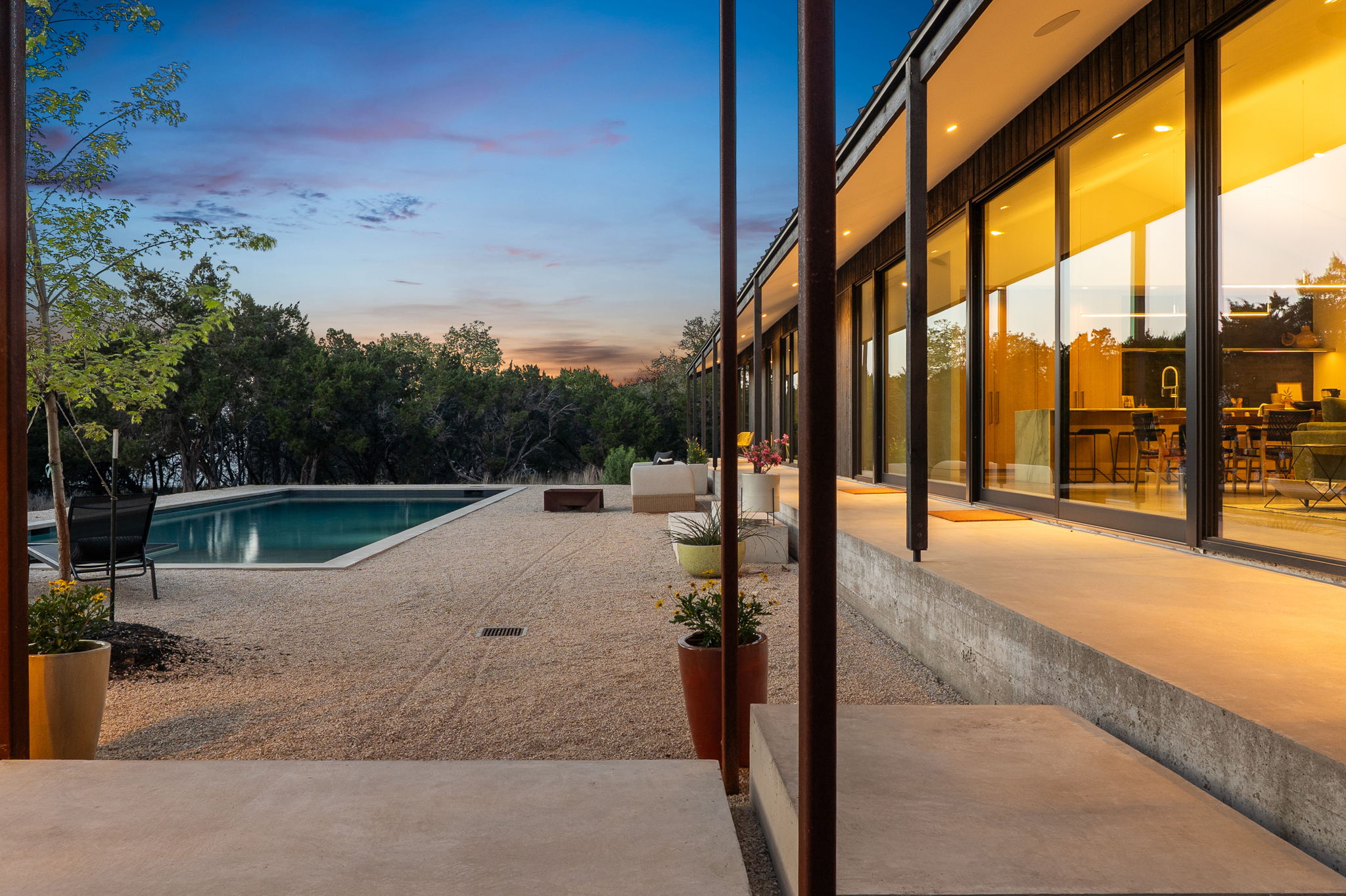 10982 Long Branch Drive Austin, TX 78736 - Photo 4 of 40 a view of a swimming pool with a patio
