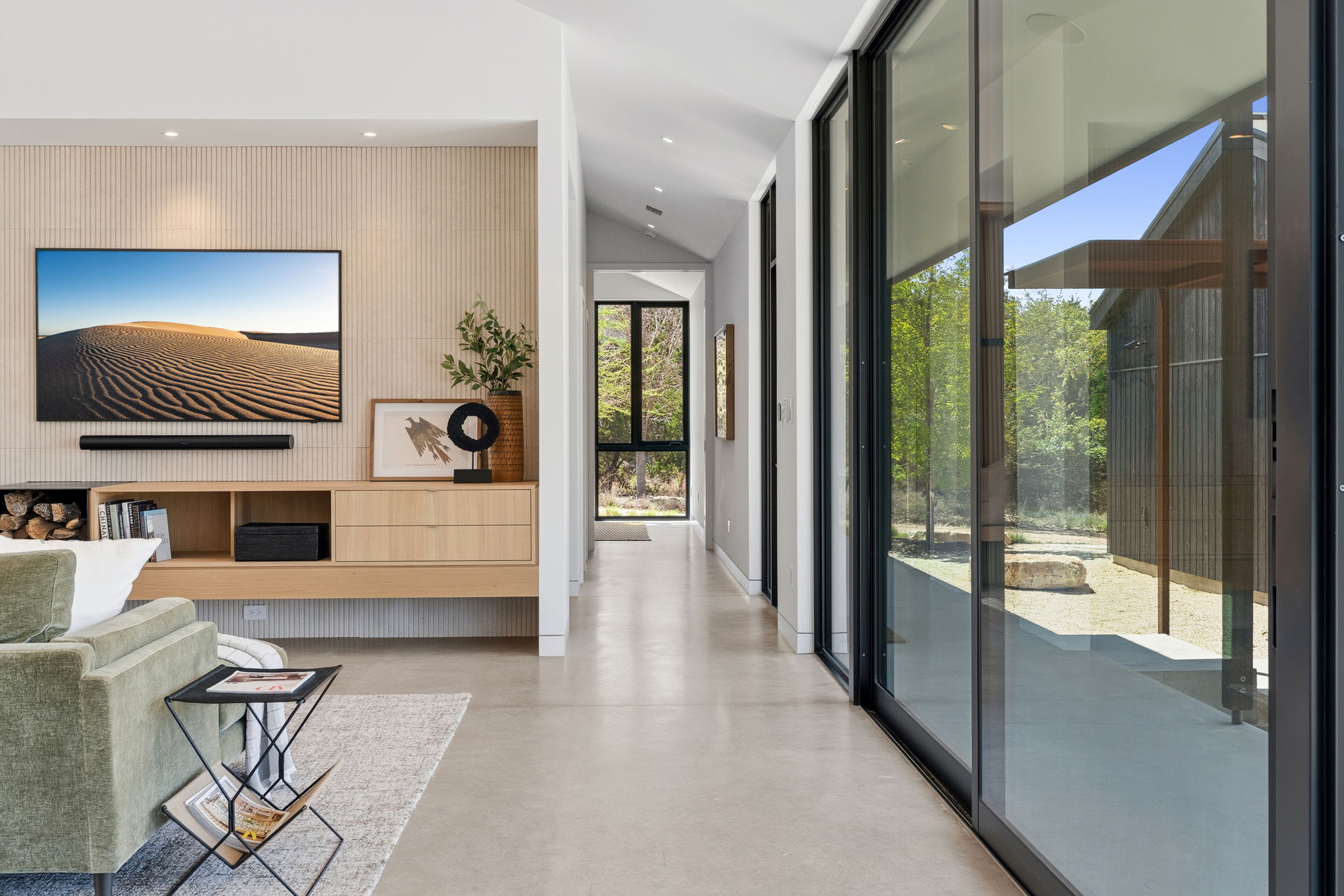 10982 Long Branch Drive Austin, TX 78736 - Photo 8 of 40 a lobby with furniture and floor to ceiling window