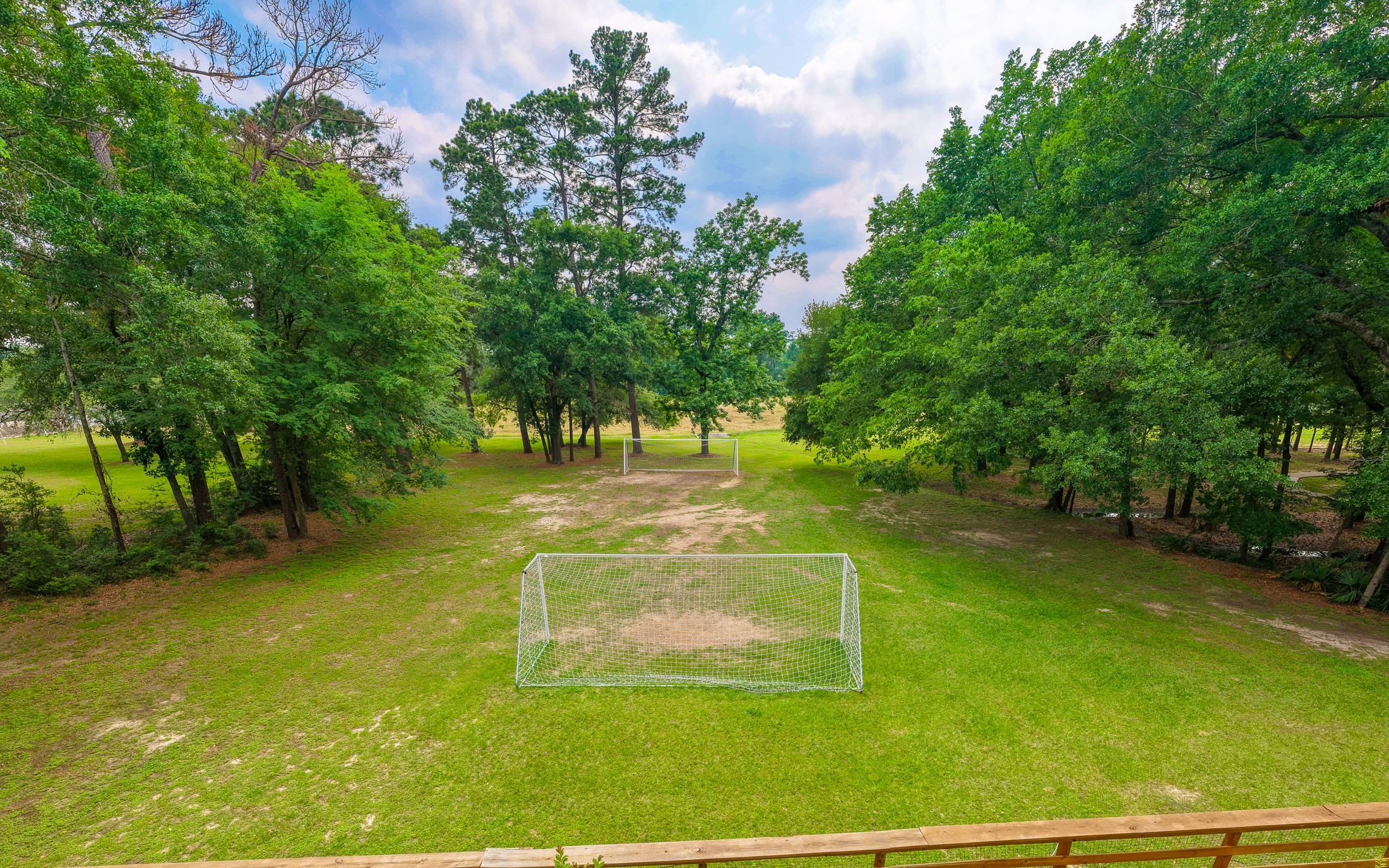 20214 Woodsboro Court Spring, TX 77388 - Photo 48 of 50 Oaks of Devonshire features a 5-Acre Community Park with Jr. Olympic Pool, 2 Water Slides, Clubhouse/Party Rm, 2 Tennis/Pickle Ball Cts, Pavilion, Basketball Ct, 2 Playgrounds, Soccer Field & Baseball Field, and Walking Trails!