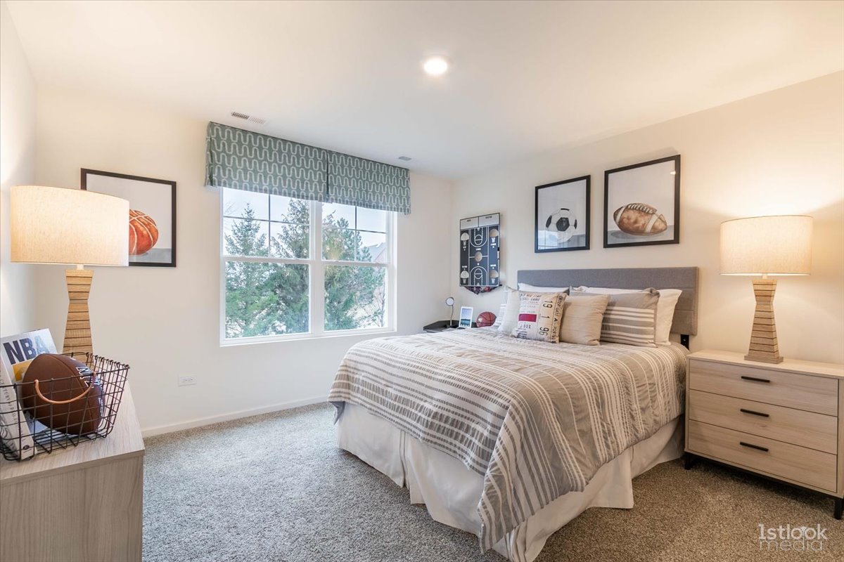 10453 Privet Drive St. John, IN 46307 - Photo 25 of 37 a bedroom with a bed and a window