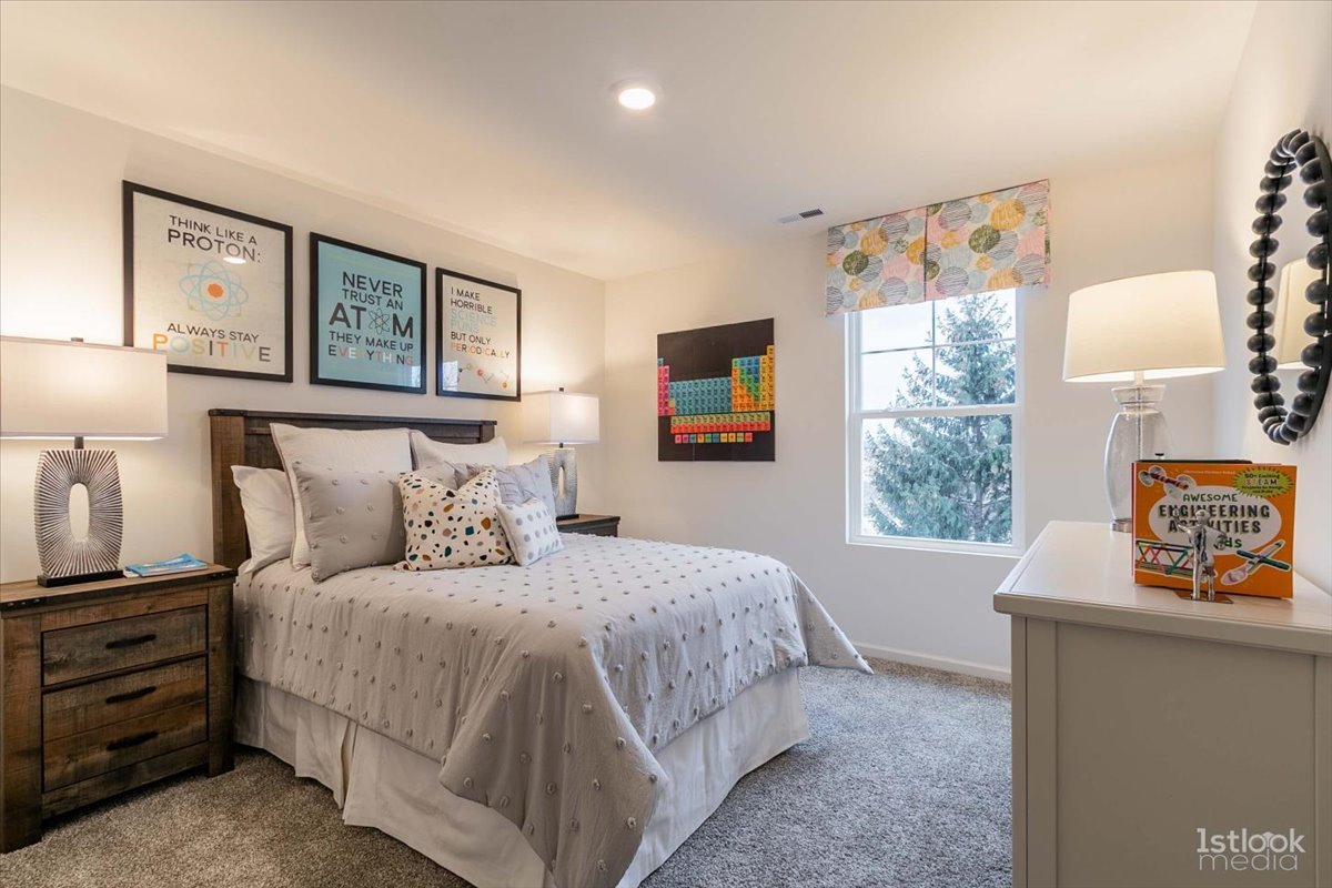 10453 Privet Drive St. John, IN 46307 - Photo 27 of 37 a bedroom with a bed and a window