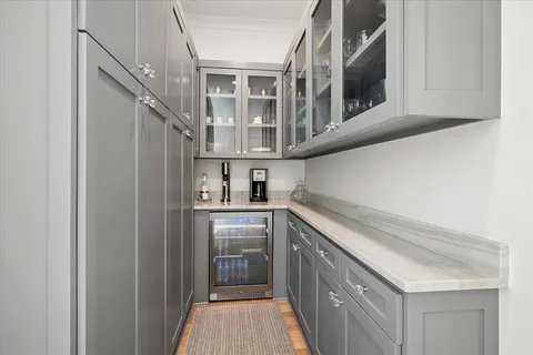a kitchen with stainless steel appliances granite countertop a sink and cabinets