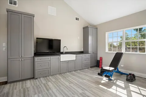 a living room with furniture and flat screen tv