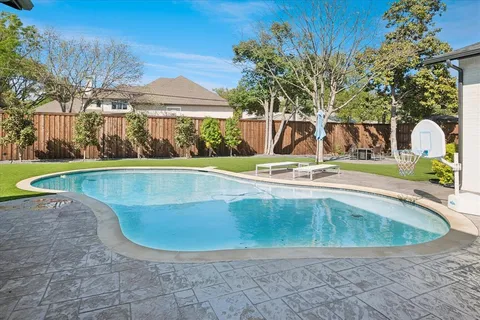 a view of outdoor space yard and swimming pool
