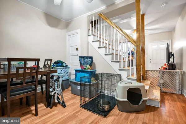 a view of entryway livingroom and hall with wooden floor