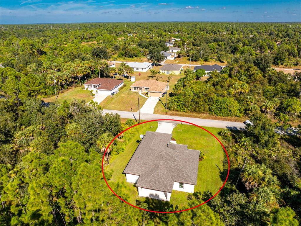 6397 Filbert Street North Port, FL 34288 - Photo 64 of 71 an aerial view of residential houses with outdoor space
