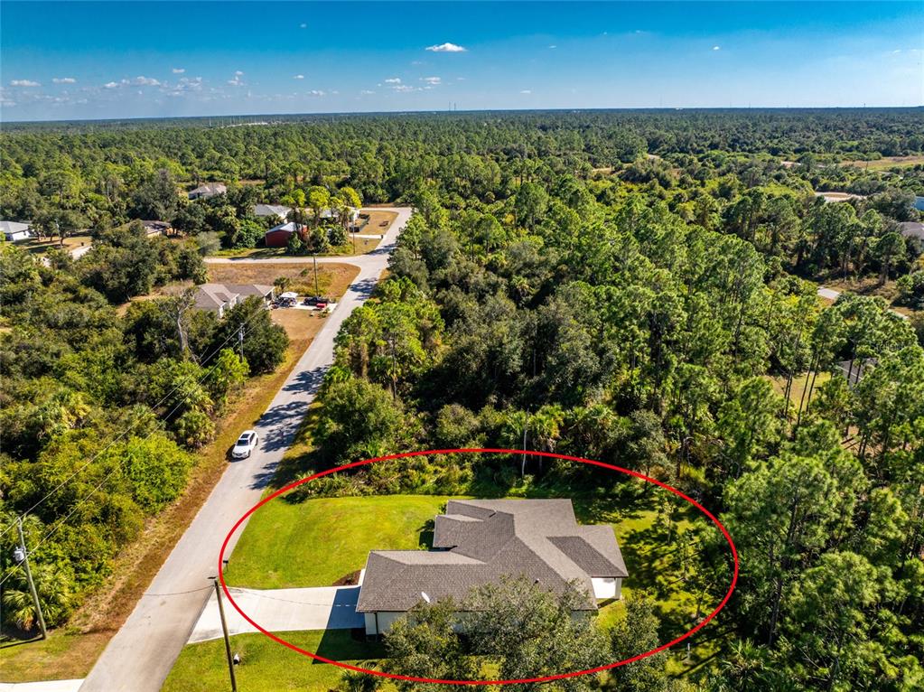 6397 Filbert Street North Port, FL 34288 - Photo 68 of 71 an aerial view of residential houses with outdoor space