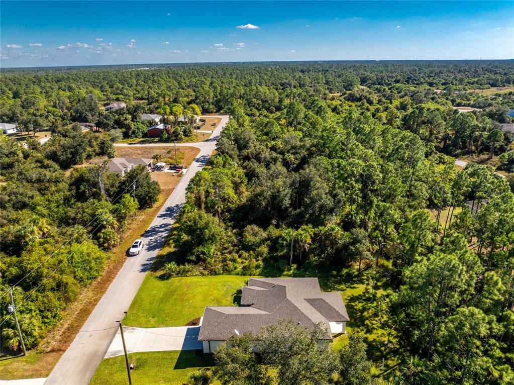 6397 Filbert Street North Port, FL 34288 - Photo 69 of 71 an aerial view of residential houses with outdoor space