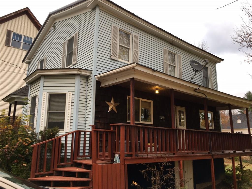 7 Dustin Street Dexter, ME 04930 - Photo 2 of 23 Side view note walk out door to basement