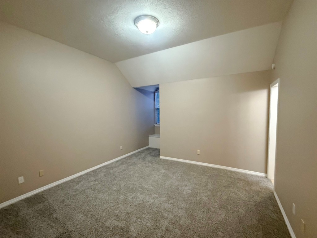 13523 Pegasus Road Cypress, TX 77429 - Photo 21 of 36 an empty room with an entryway