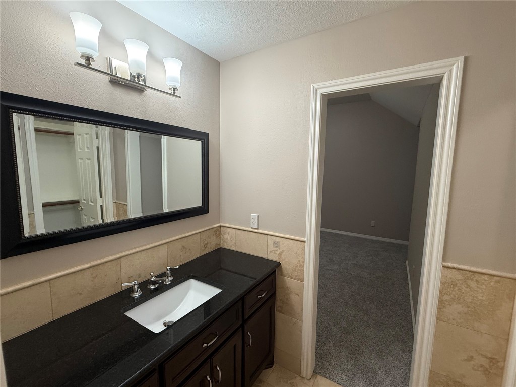 13523 Pegasus Road Cypress, TX 77429 - Photo 29 of 36 a bathroom with a sink vanity and mirror