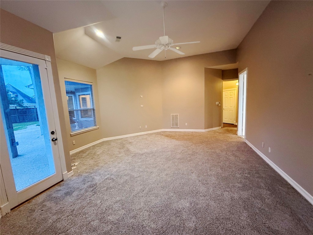 13523 Pegasus Road Cypress, TX 77429 - Photo 7 of 36 en empty room with windows and closet