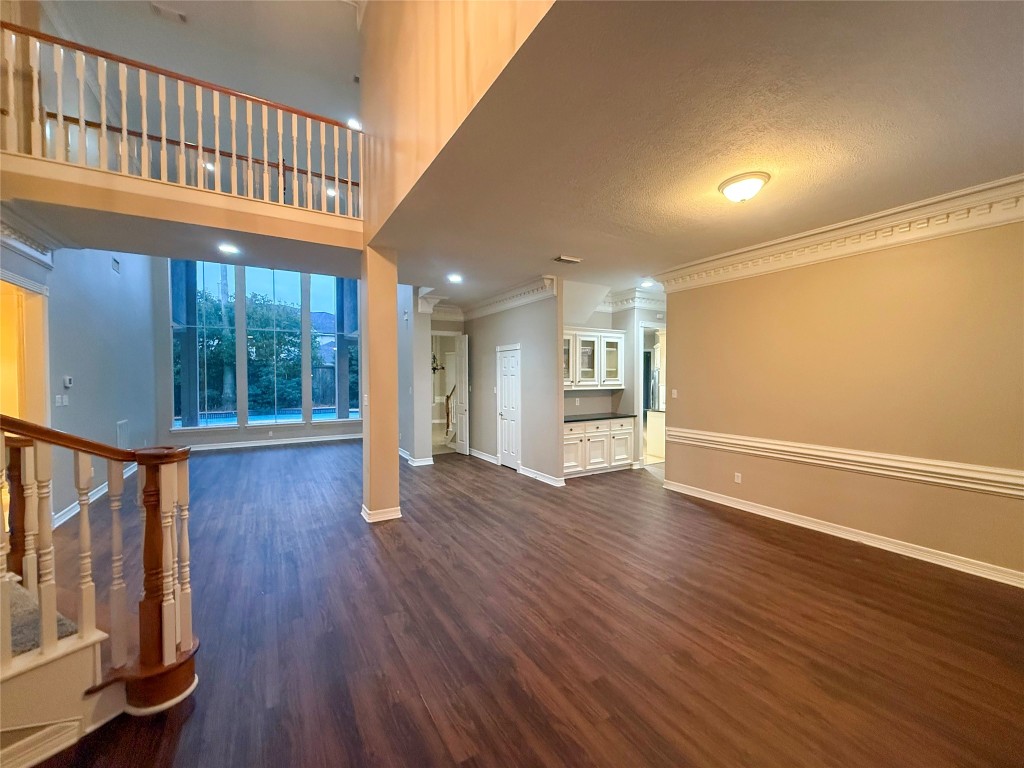 13523 Pegasus Road Cypress, TX 77429 - Photo 9 of 36 a view of an entryway with wooden floor and door