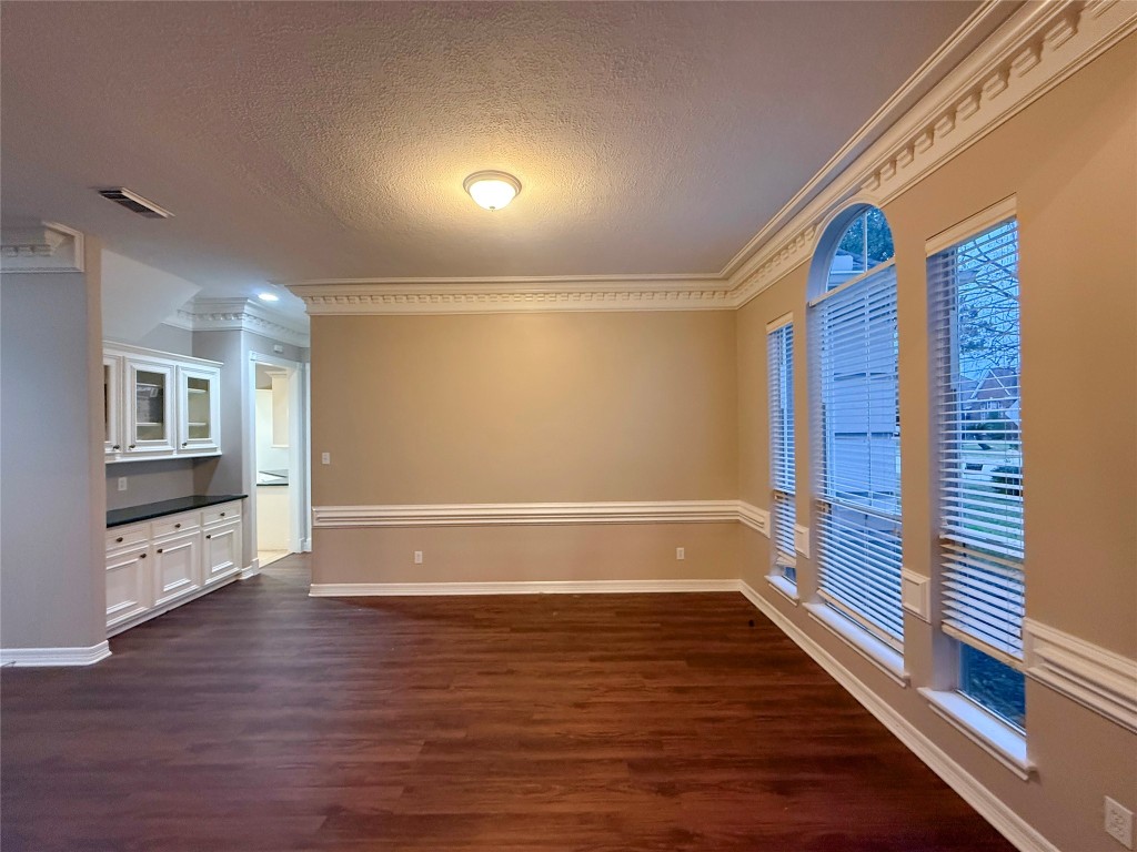 13523 Pegasus Road Cypress, TX 77429 - Photo 10 of 36 a view of an empty room with wooden floor and a window