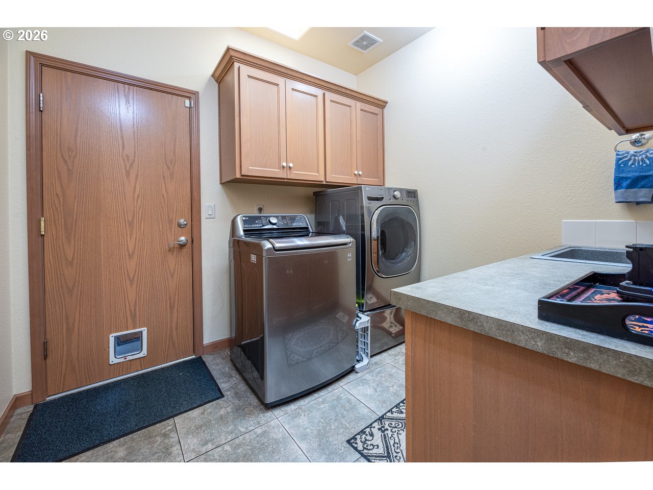 3381 Rosemont Way Eugene, OR 97401 - Photo 35 of 45 a kitchen with refrigerator and window
