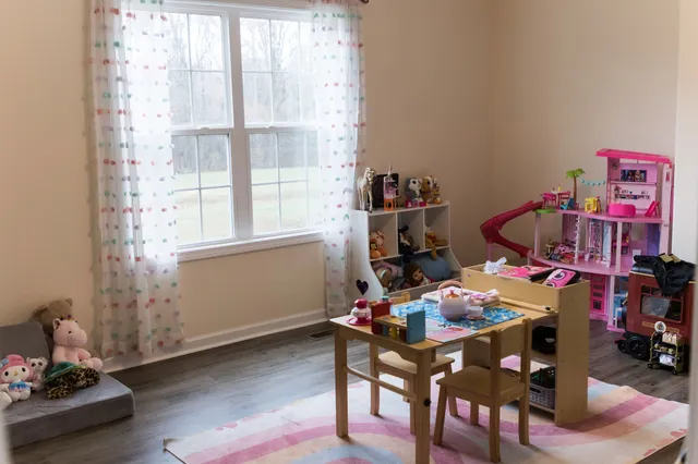 a room with furniture and a window