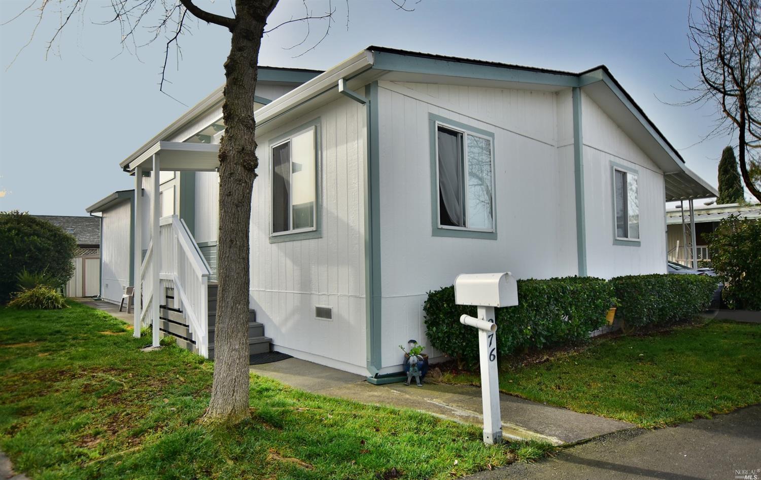 276 Pear Lane, Unit 276 Santa Rosa, CA 95407 - Photo 1 of 1 a front view of a house with garden