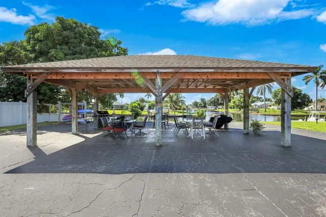 a view of a swimming pool with a patio