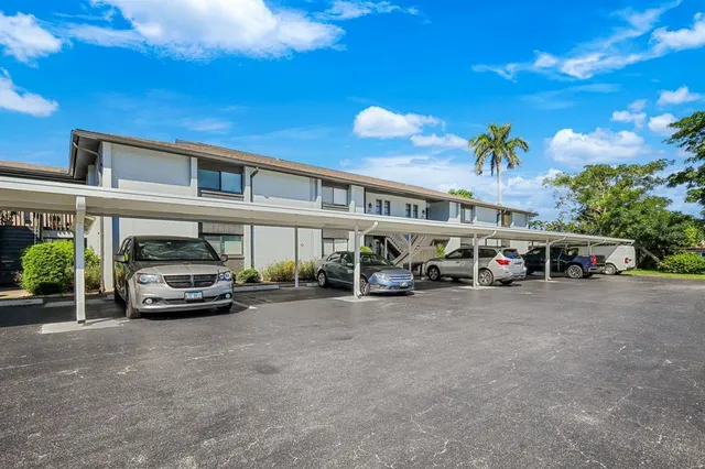 a view of a swimming pool with a lounge chairs