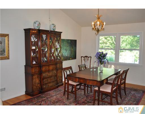 9 Agate Road East Brunswick, NJ 08816 - Photo 4 of 19 a view of a dining room with furniture window and outside view