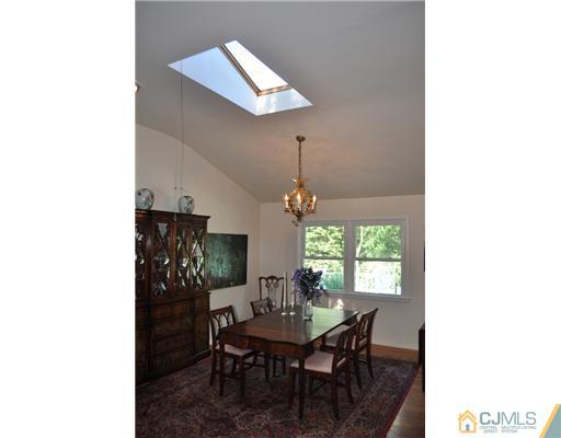9 Agate Road East Brunswick, NJ 08816 - Photo 5 of 19 a view of a dining room with furniture and window