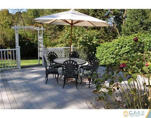 9 Agate Road East Brunswick, NJ 08816 - Photo 10 of 19 a view of an outdoor sitting area with furniture
