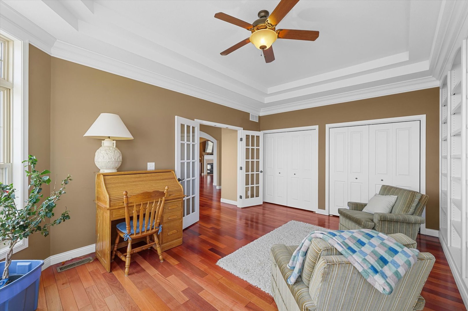 2595 500 East Mahomet, IL 61853 - Photo 28 of 84 a bedroom with a bed and a chandelier