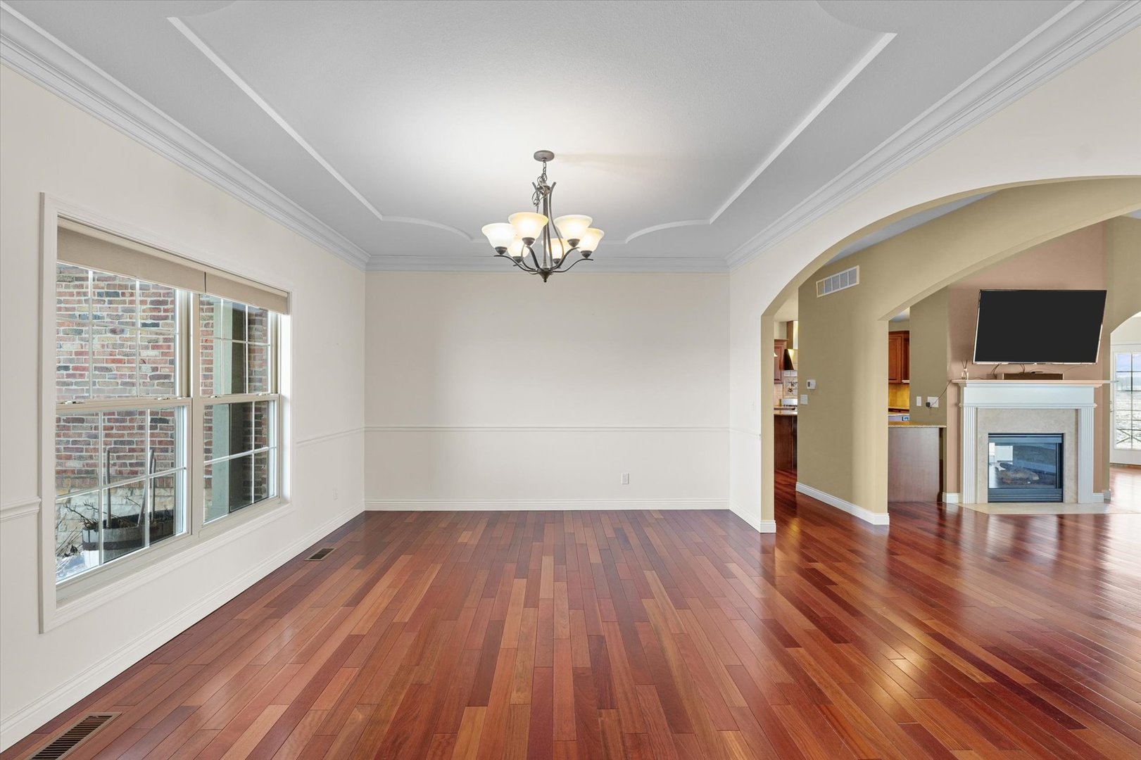 2595 500 East Mahomet, IL 61853 - Photo 29 of 84 wooden floor in an empty room with a window