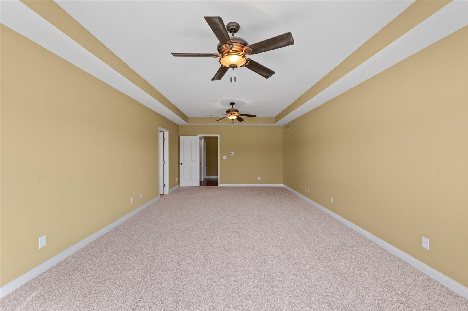 2595 500 East Mahomet, IL 61853 - Photo 32 of 84 a view of an empty room and a ceiling fan
