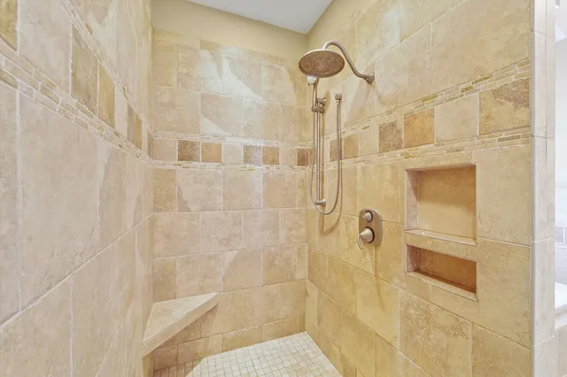 a view of a house with a yard and a large pool