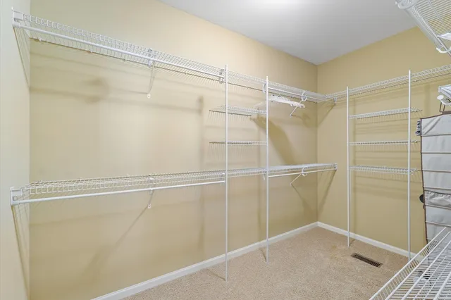 a view of a house with a yard porch and sitting area