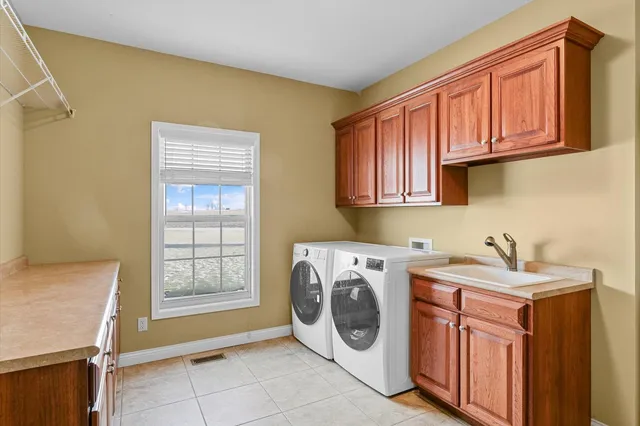 a aerial view of a house with a yard