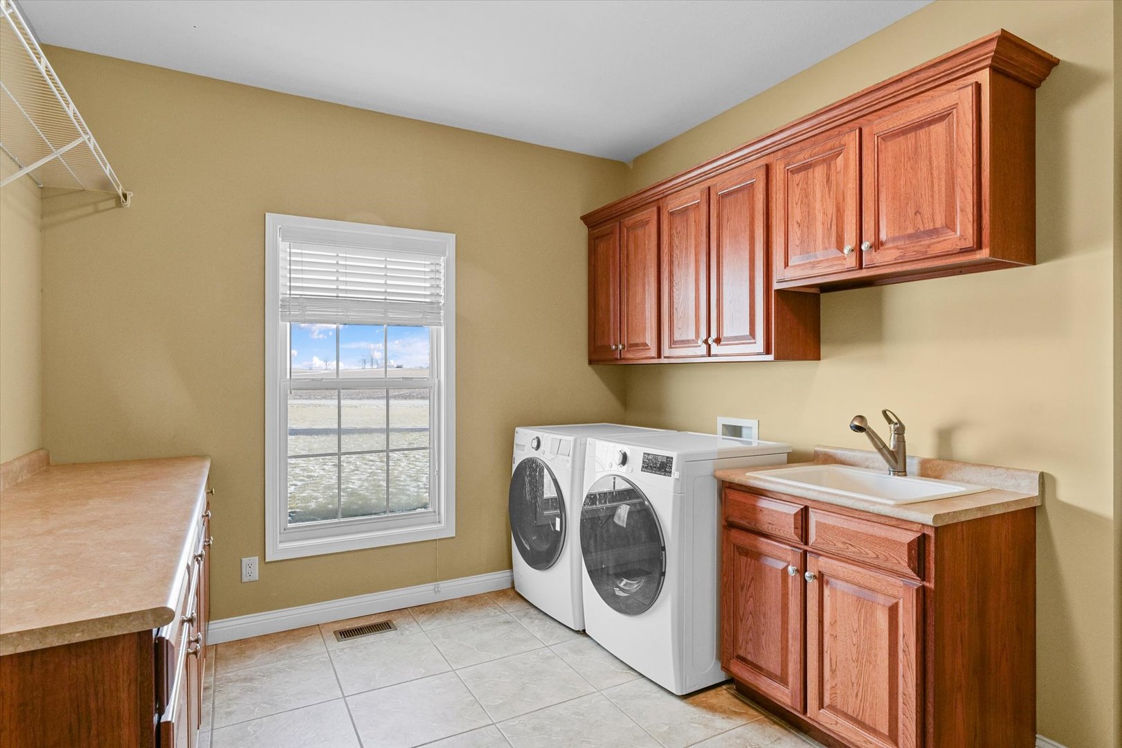 2595 500 East Mahomet, IL 61853 - Photo 40 of 84 a utility room with sink dryer and washer