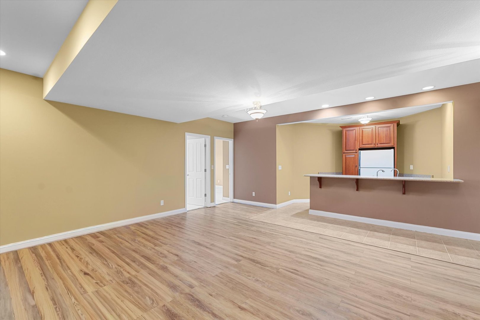 2595 500 East Mahomet, IL 61853 - Photo 43 of 84 a view of an empty room with wooden floor and a window
